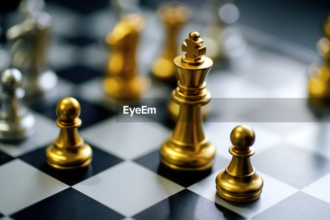Close-up of chess board on table