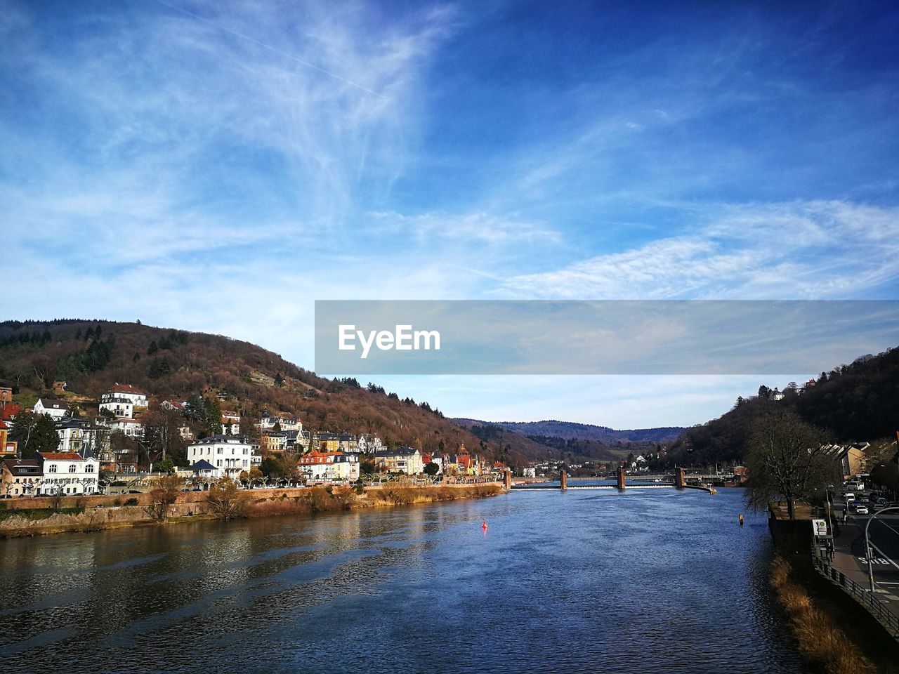 BUILDINGS BY TOWN AGAINST SKY