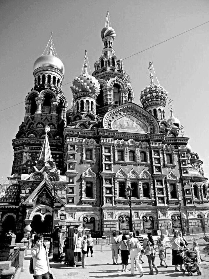 TOURISTS IN FRONT OF CHURCH