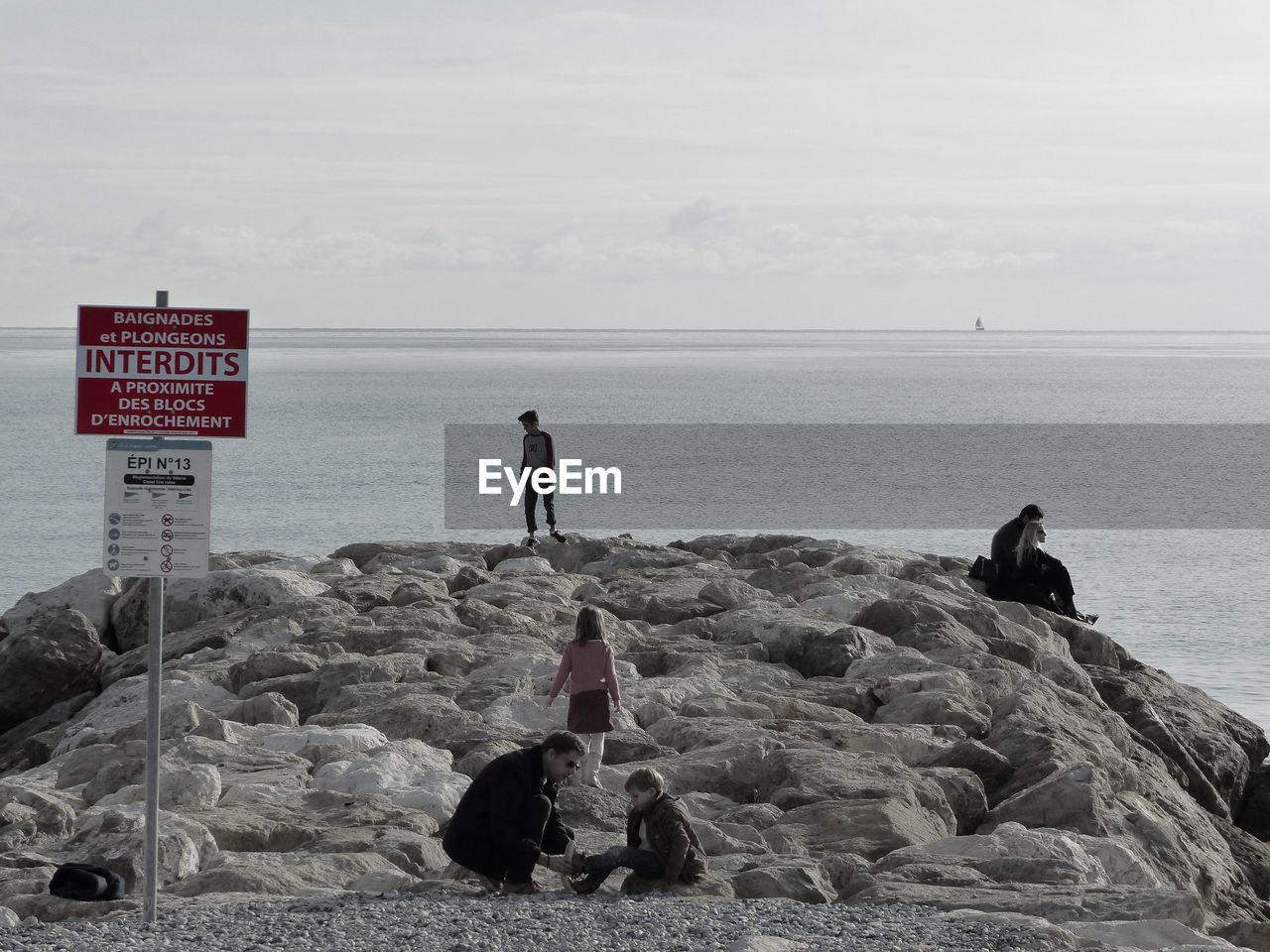 SCENIC VIEW OF SEA WITH ROCKS IN BACKGROUND