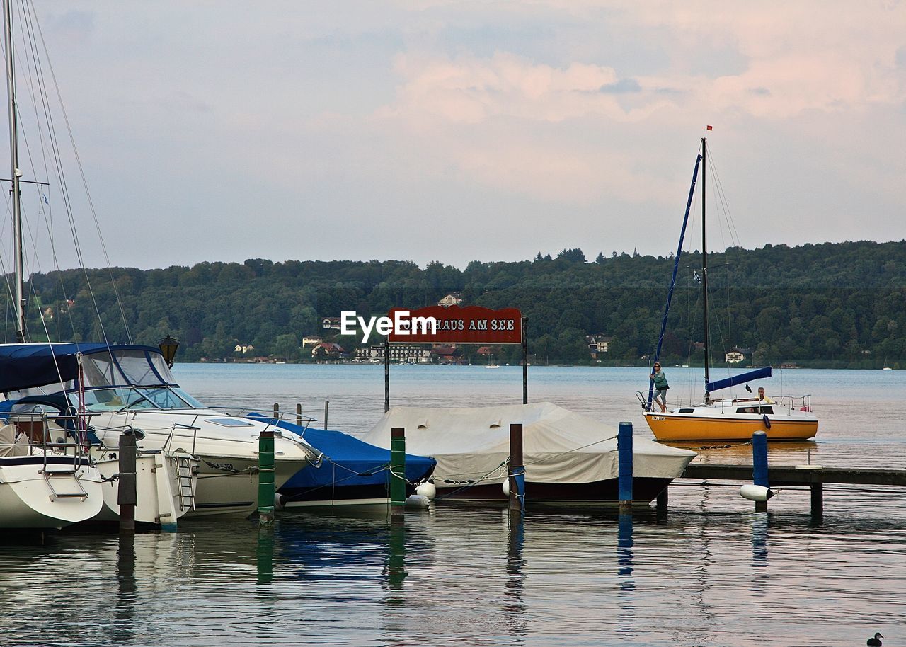 VIEW OF BOATS IN SEA