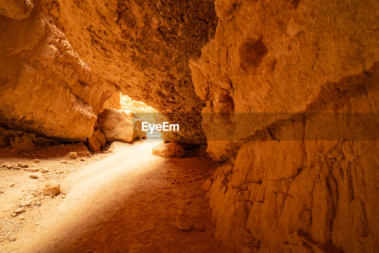 Sunlight streaming through a slot canyon found in bryce canyon national park.