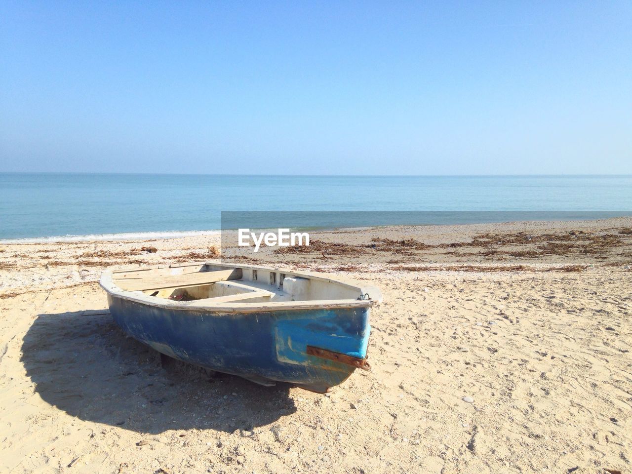 SEA SHORE AGAINST CLEAR SKY