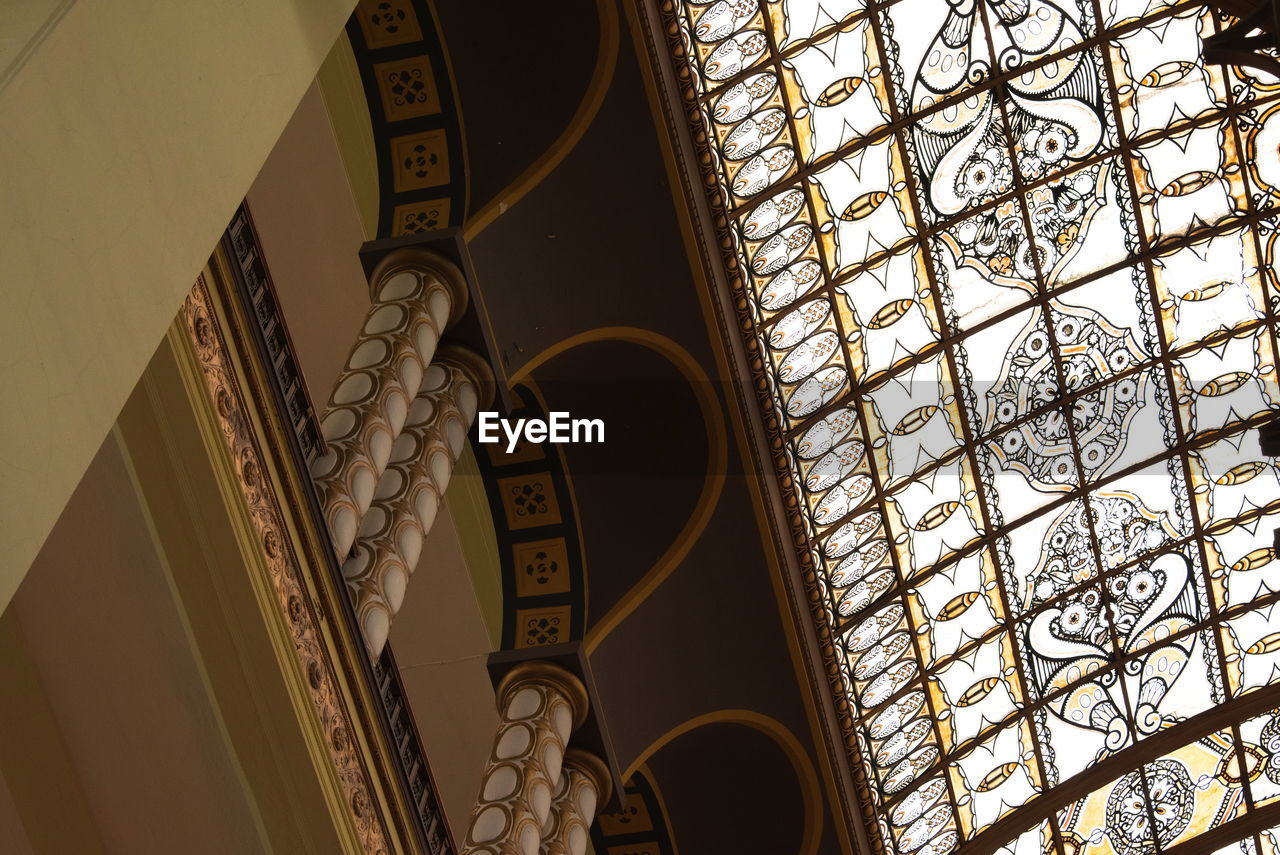 Low angle view of ornate ceiling in historic building