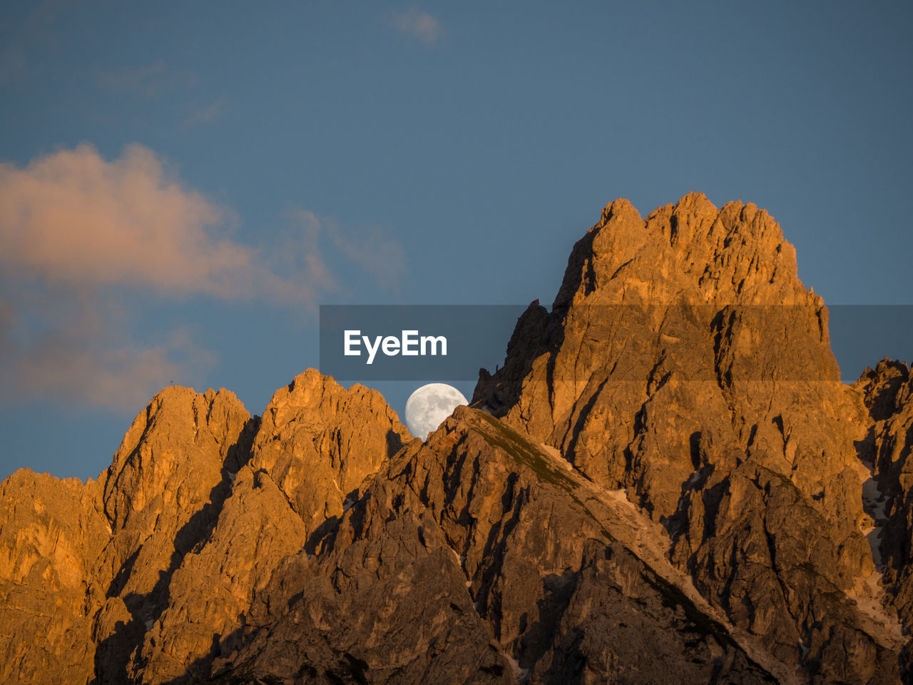 Low angle view of rock formations against sky