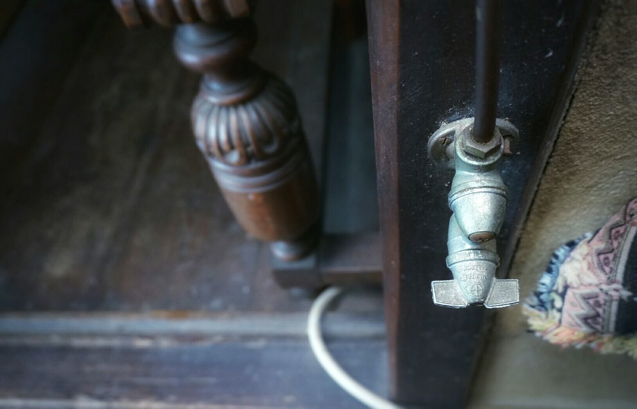 Close-up of lock on cabinet at home
