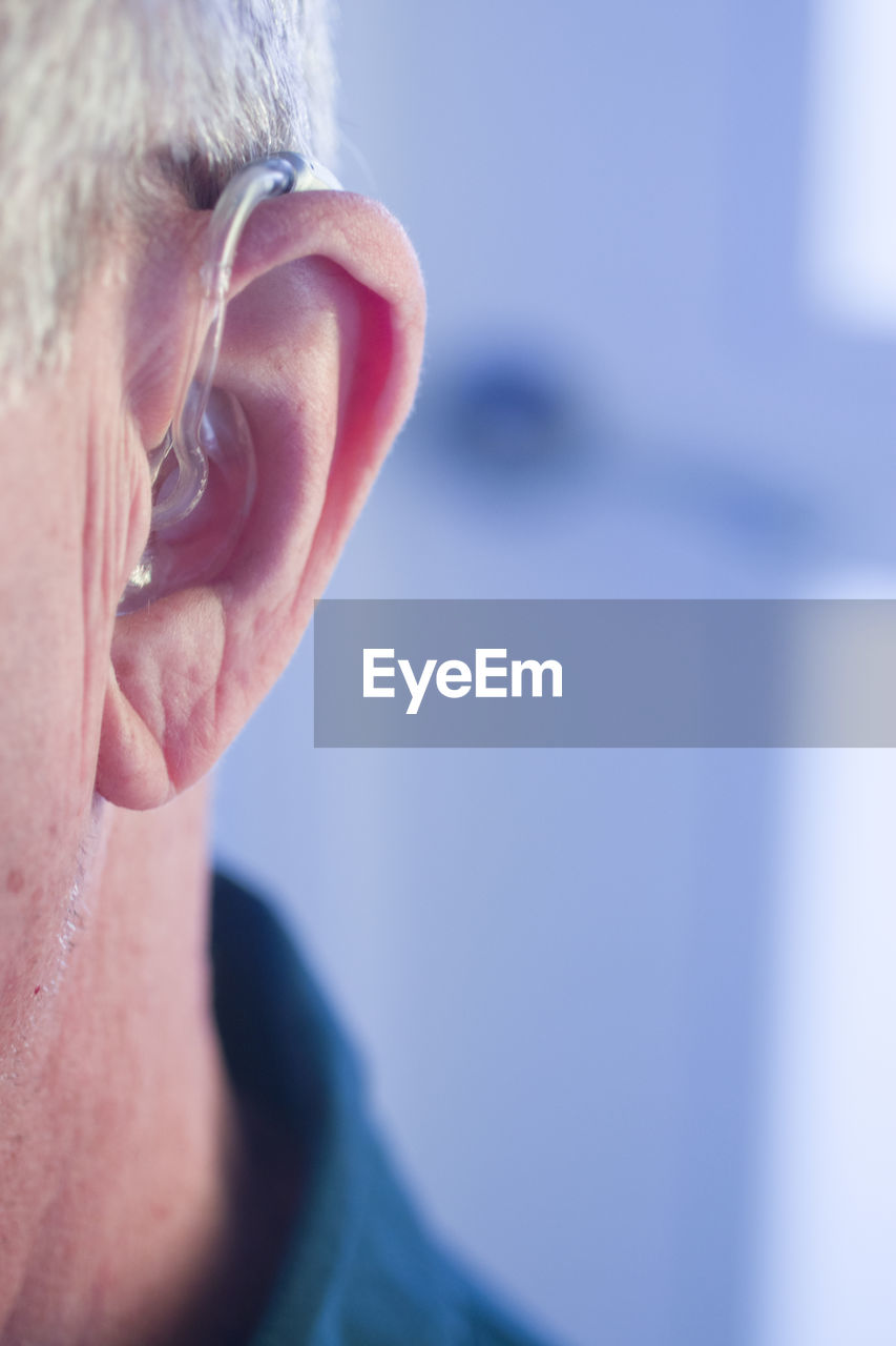 Close-up of man wearing hearing aid