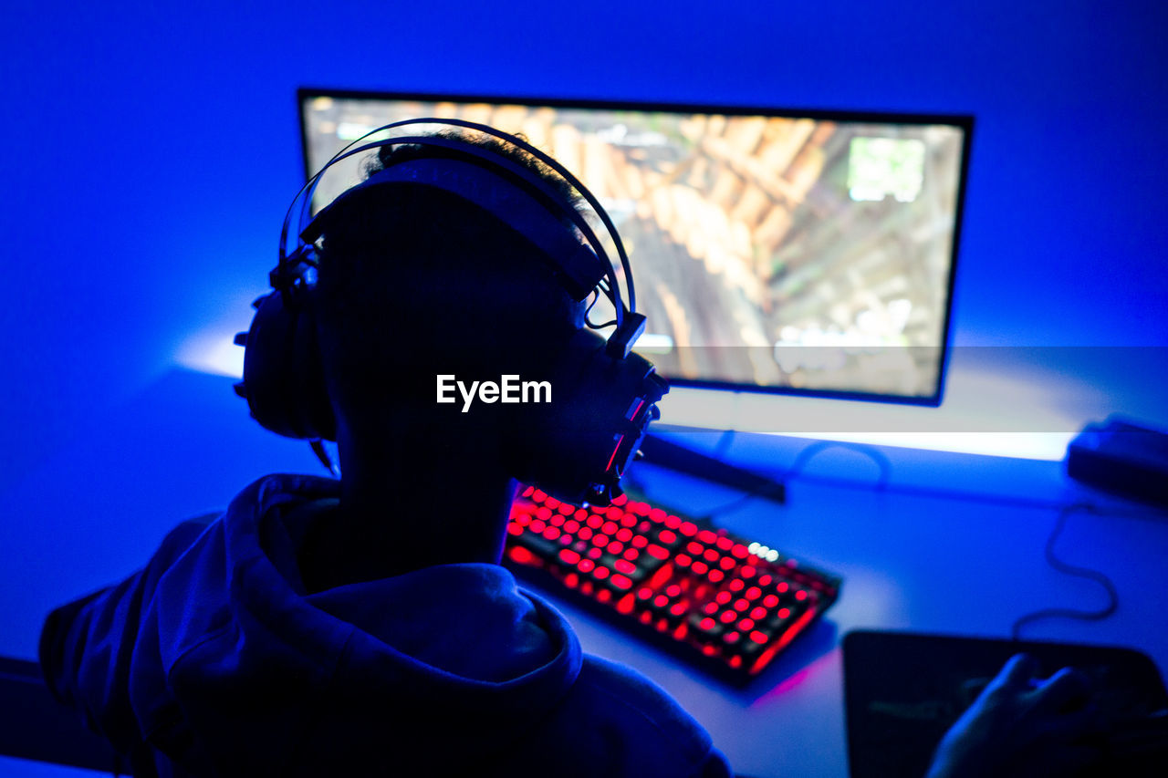 close-up of man using laptop