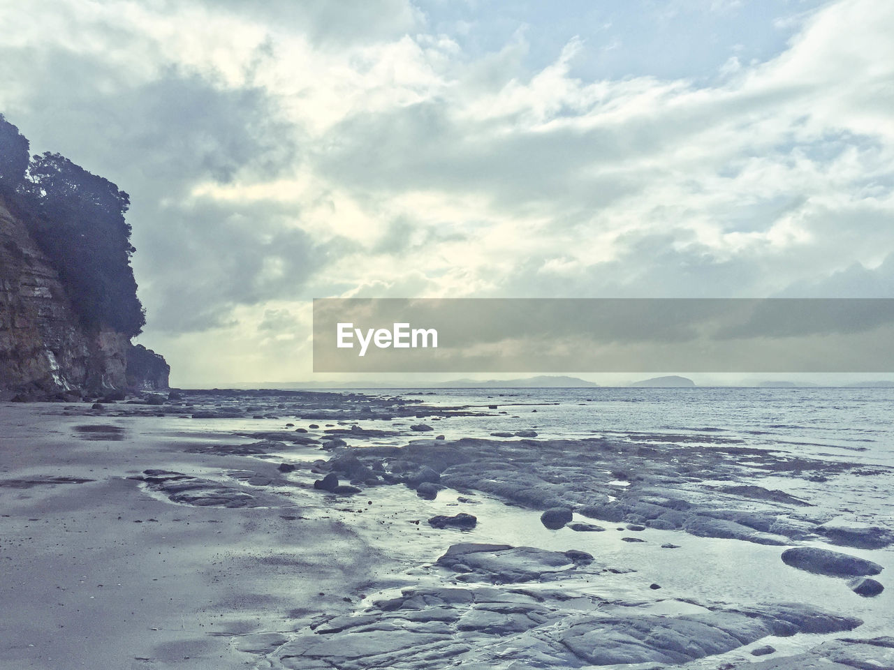 Scenic view of frozen sea against sky