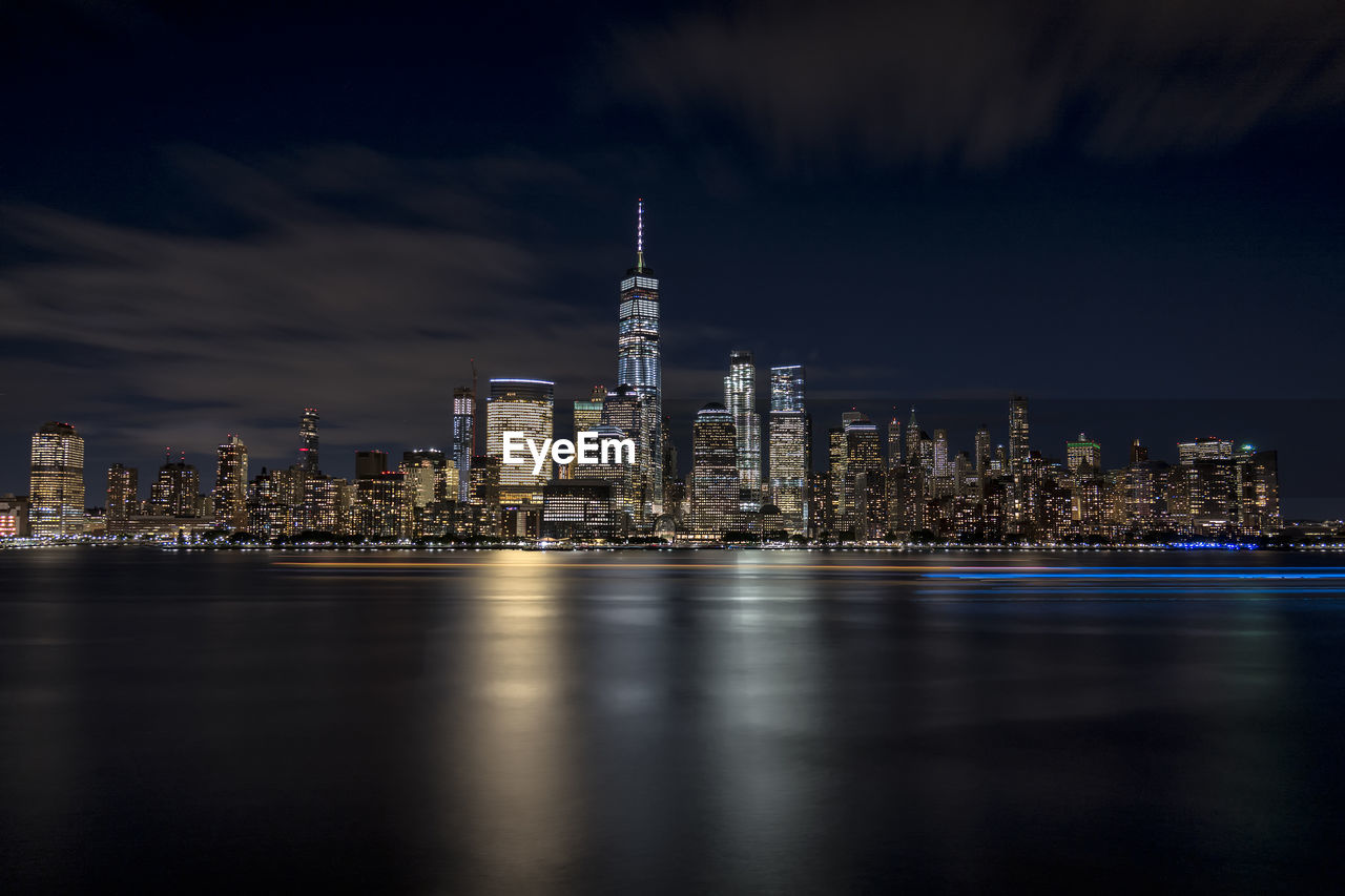 Illuminated city buildings at night