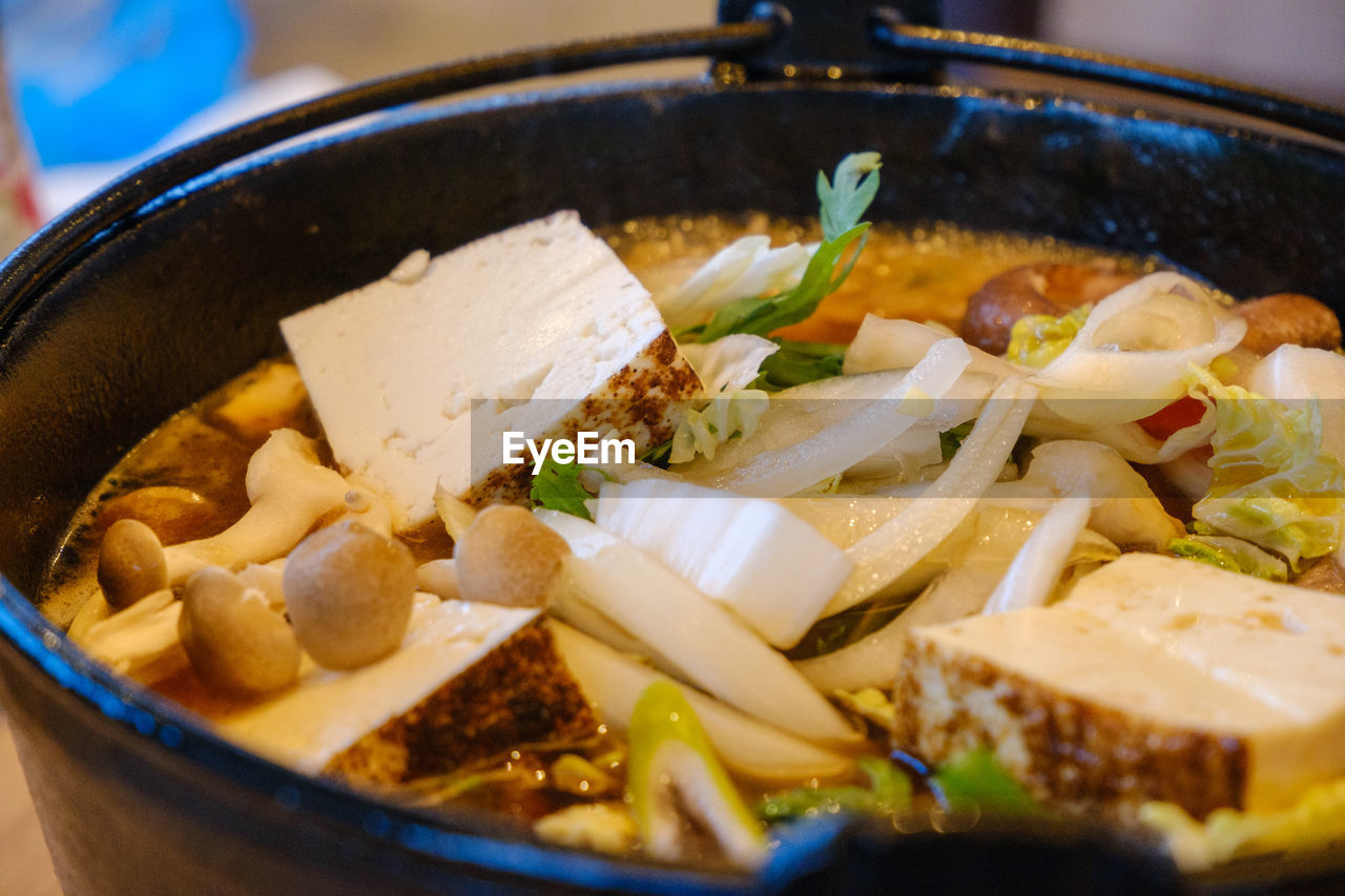 High angle view of sukiyaki in cooking pan