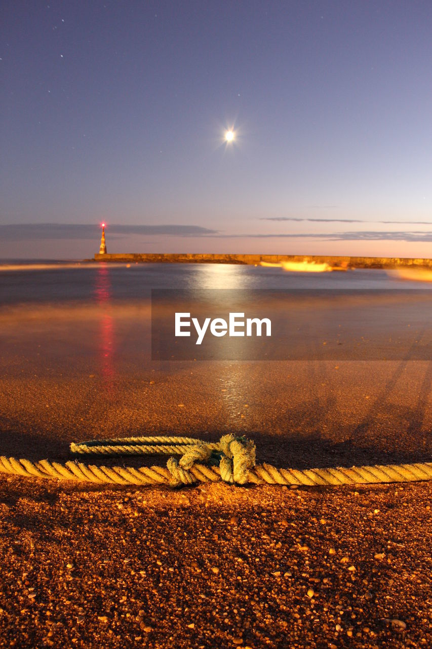 VIEW OF SEA AT SUNSET