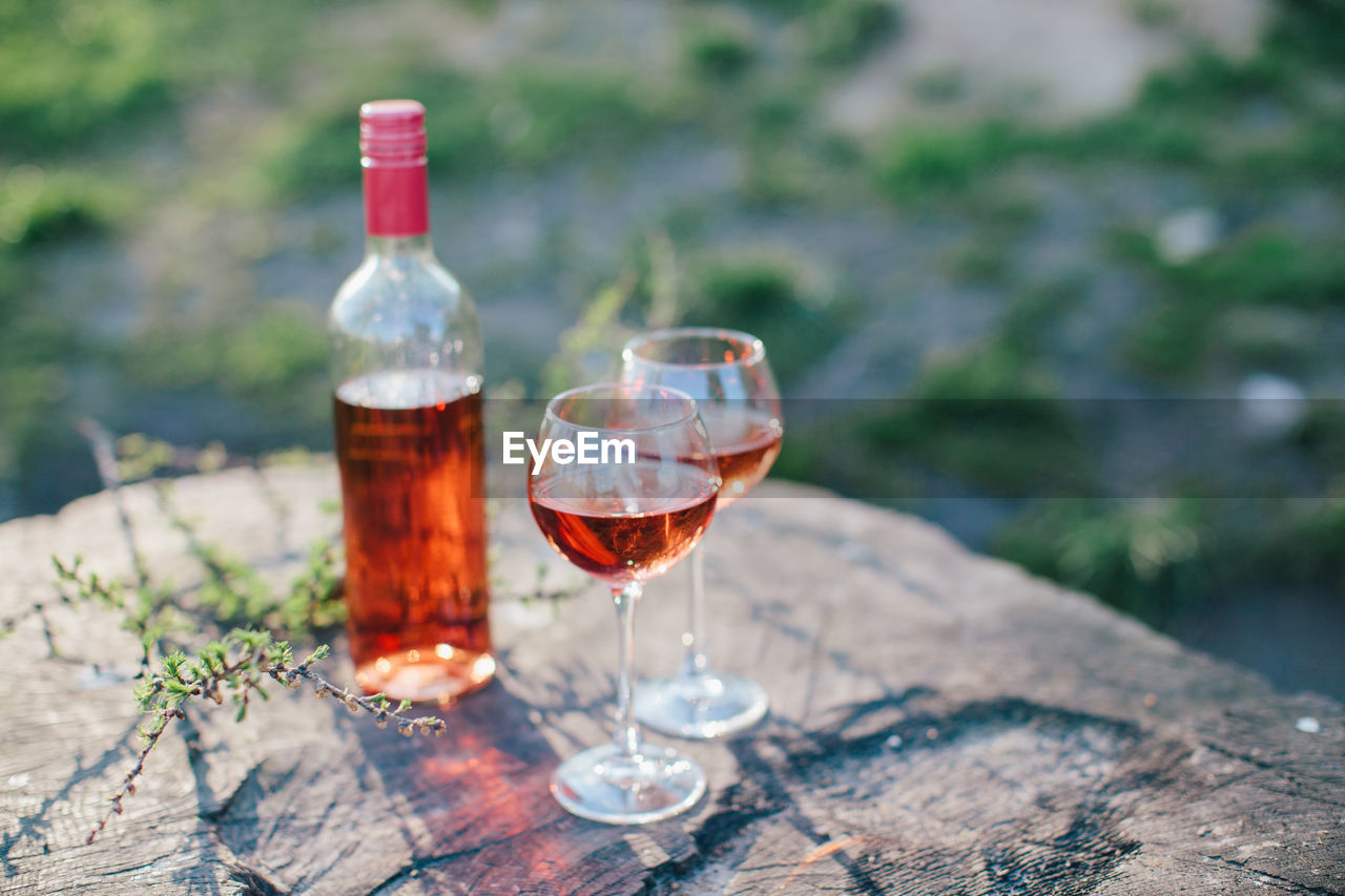 High angle view of red wine on rock