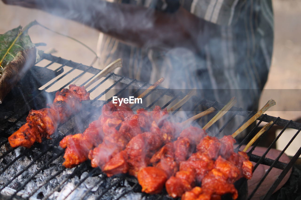 high angle view of meat on barbecue grill