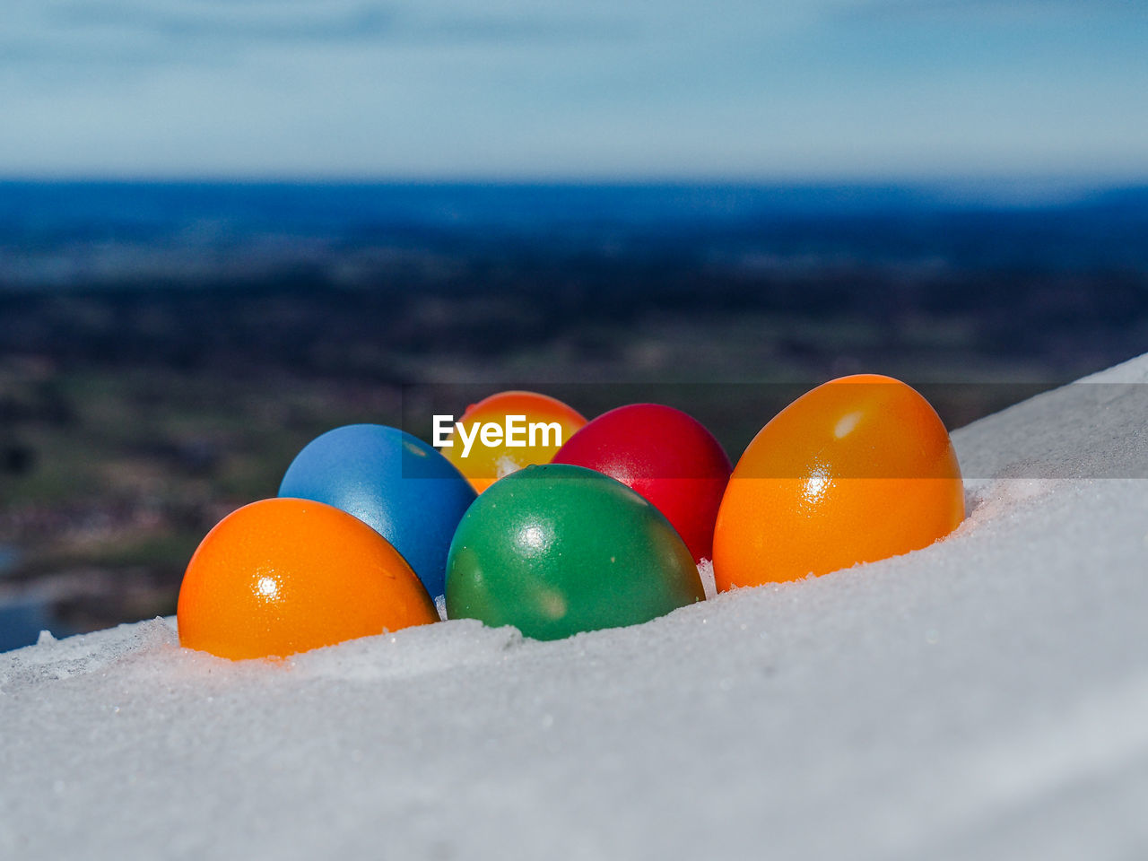 CLOSE-UP OF MULTI COLORED CANDIES ON LAND