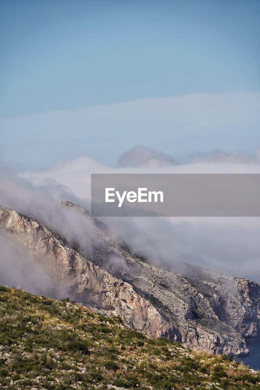 Scenic view of mountains against sky