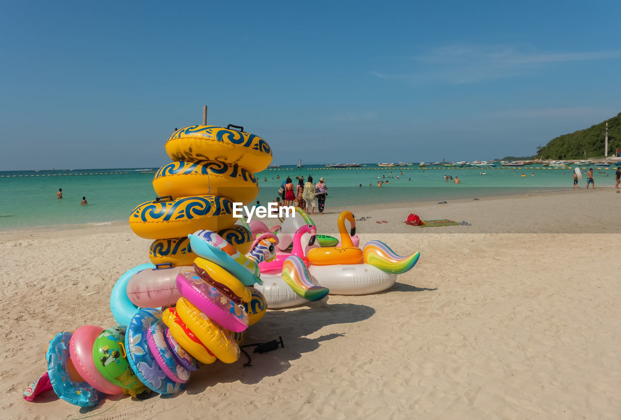 MULTI COLORED UMBRELLAS ON BEACH