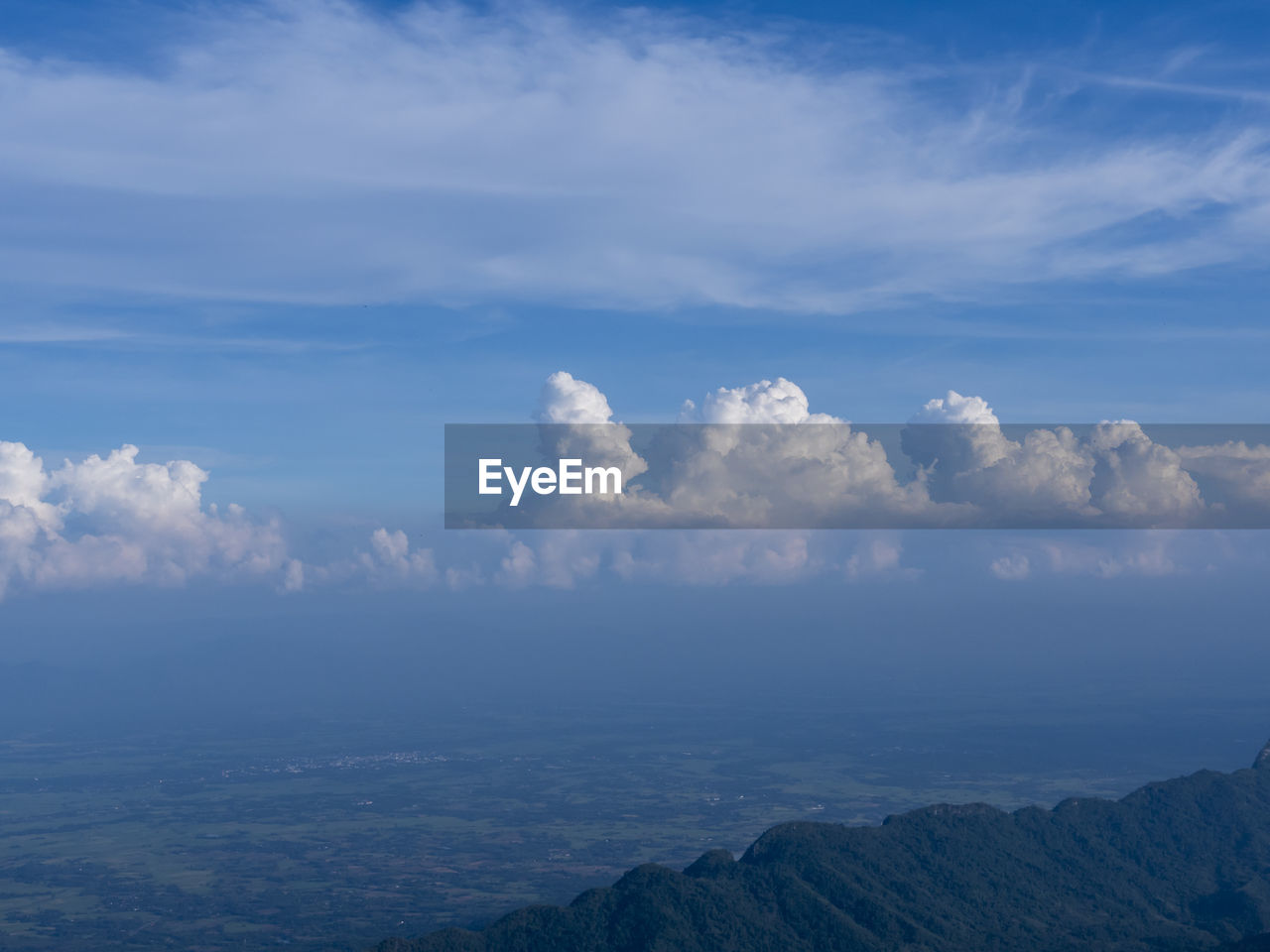Scenic view of clouds over landscape