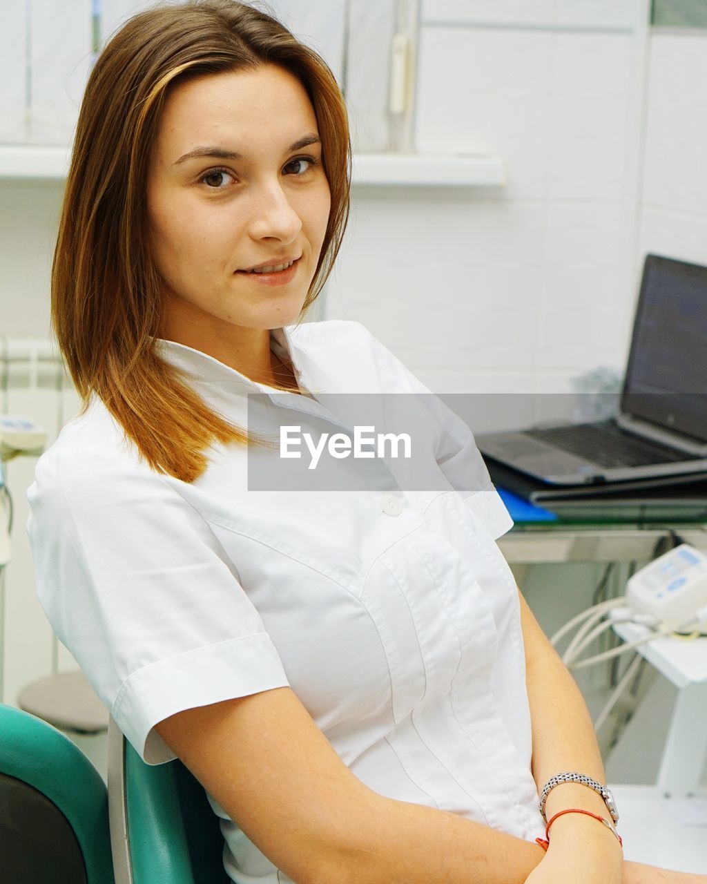 Portrait of smiling female doctor at hospital