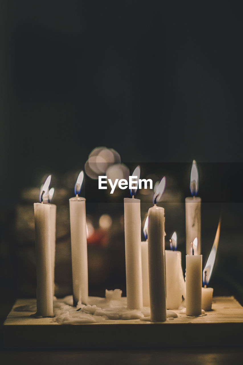 Close-up of burning candles