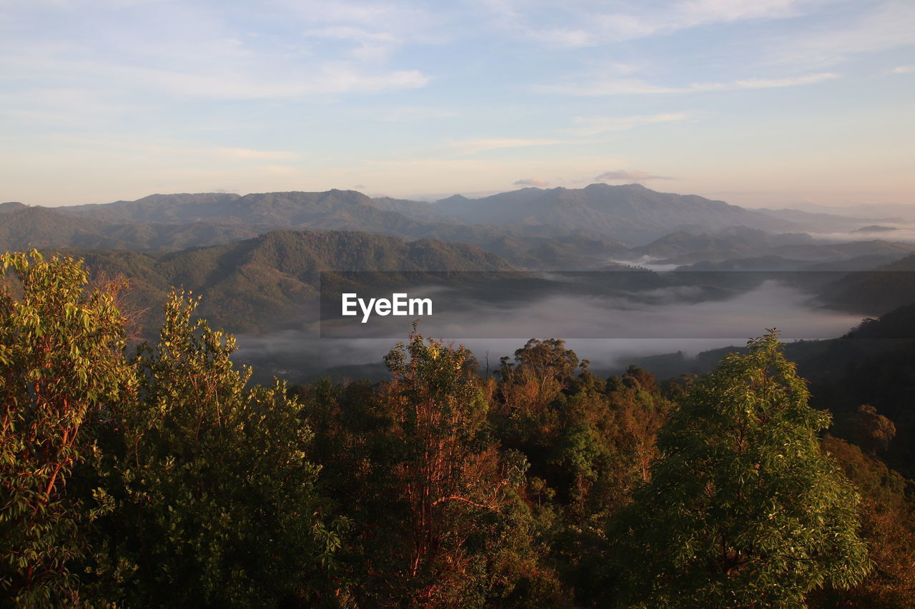 Scenic view of mountains against sky during sunset