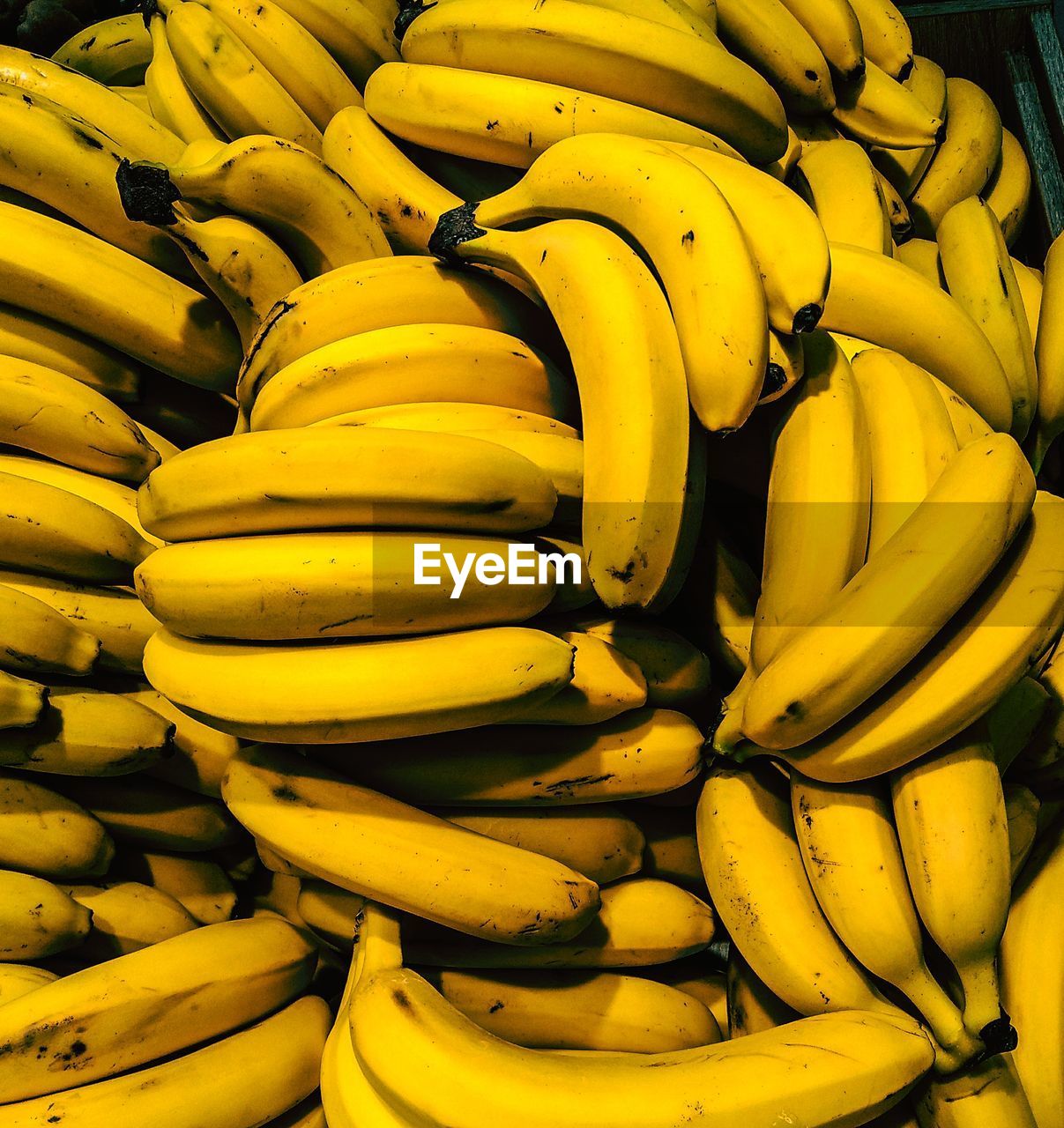 Full frame shot of yellow fruits for sale at market stall