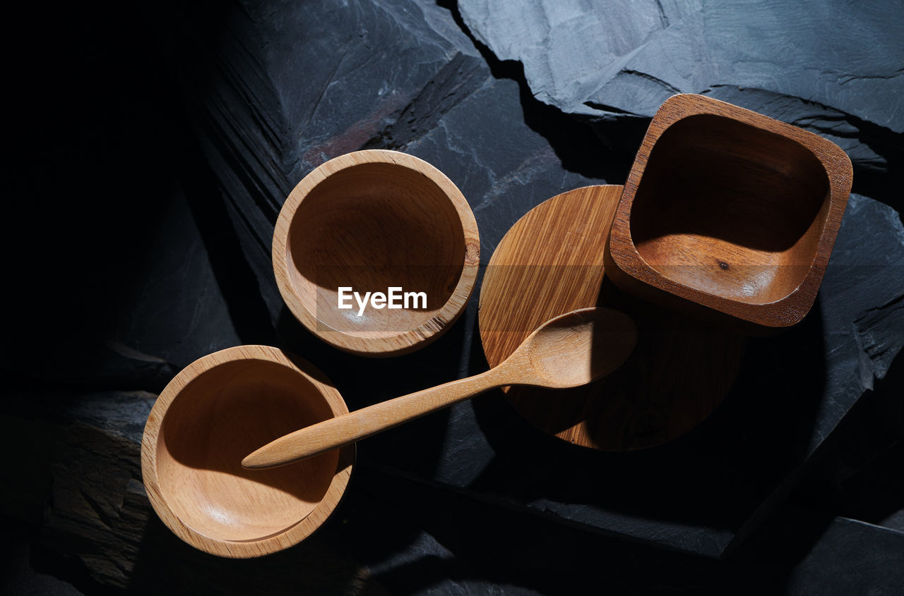 kitchen utensil, wood, spoon, wooden spoon, household equipment, indoors, no people, black, still life, high angle view, still life photography, dark, brown, studio shot