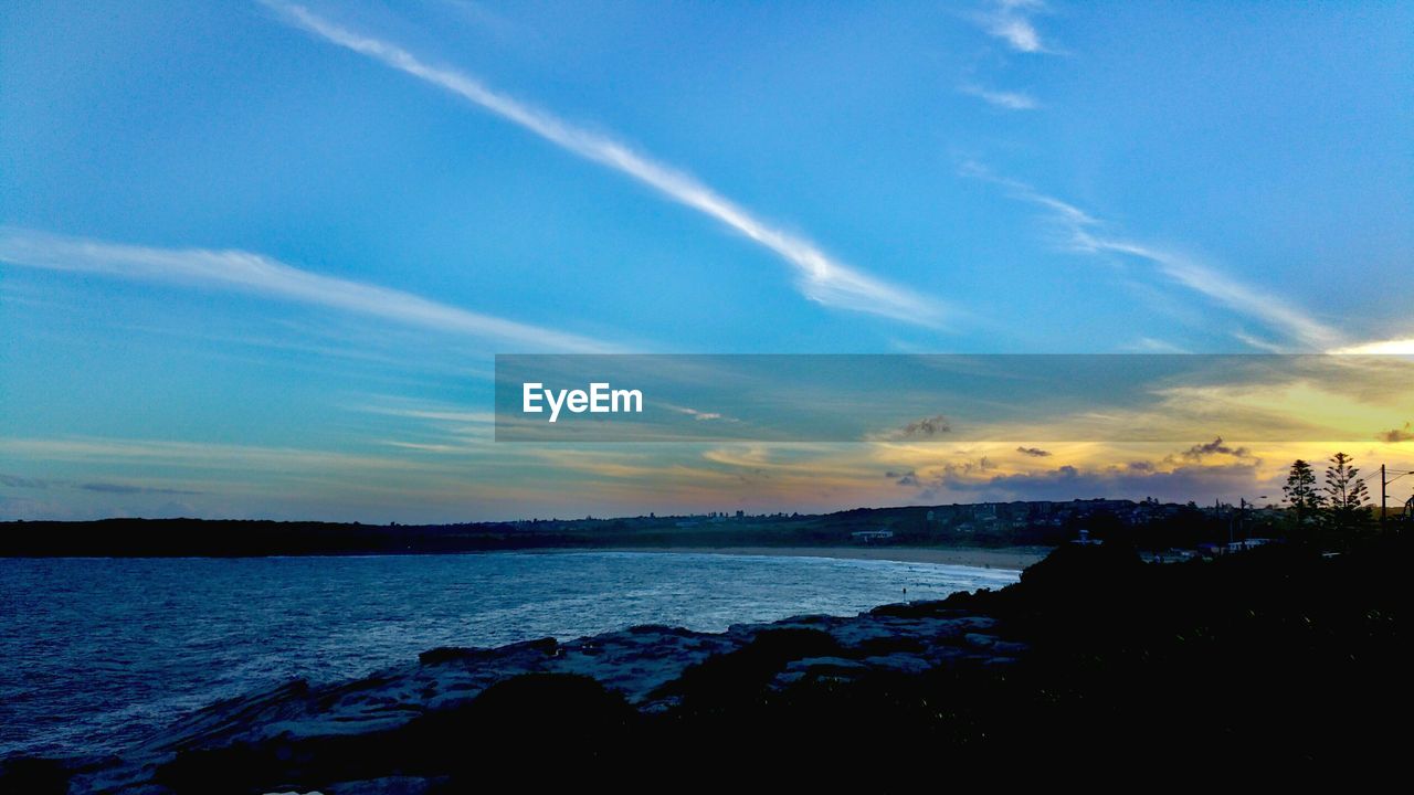 VIEW OF SEA AGAINST BLUE SKY