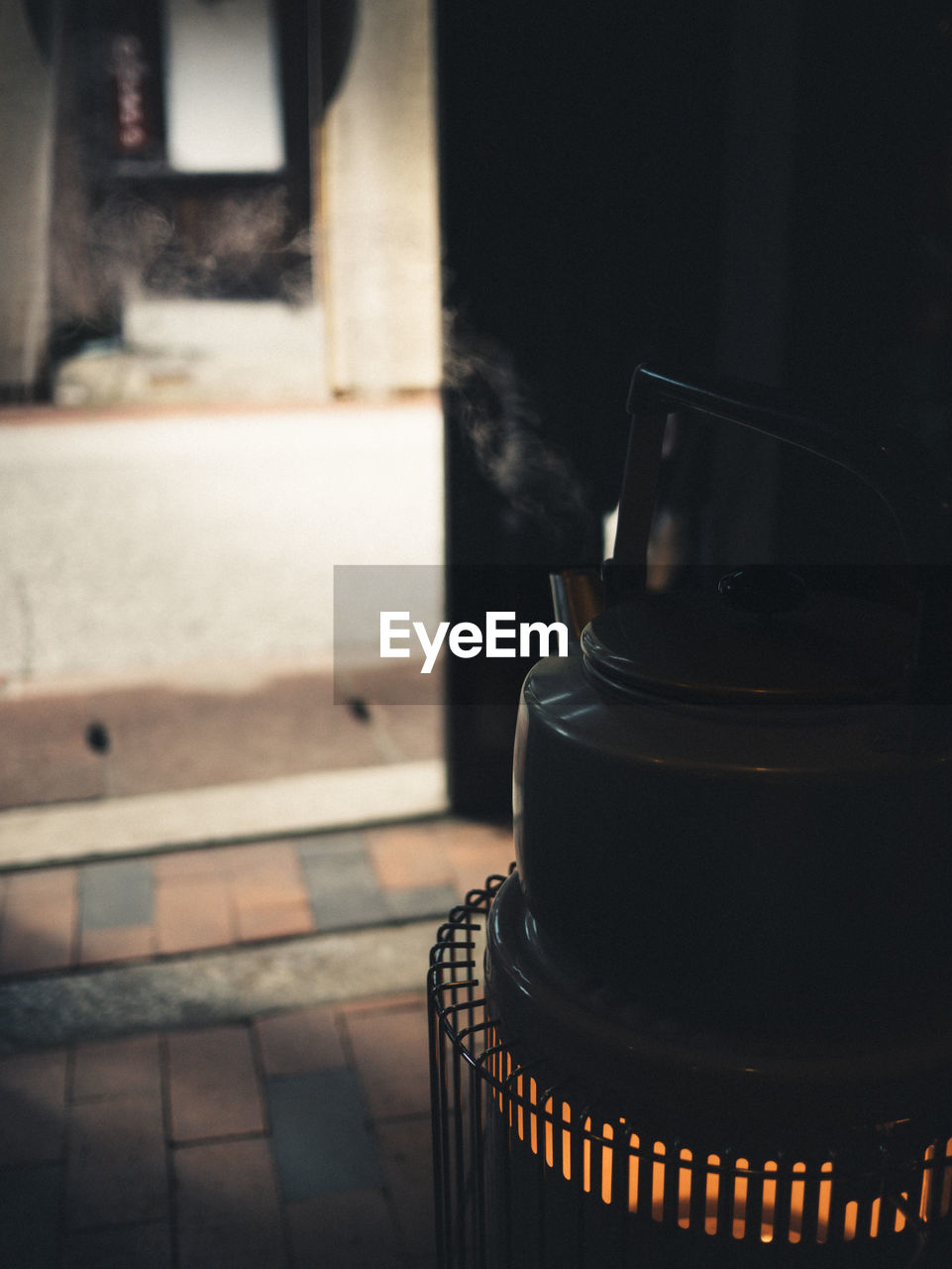 Close-up of kettle on stove at home