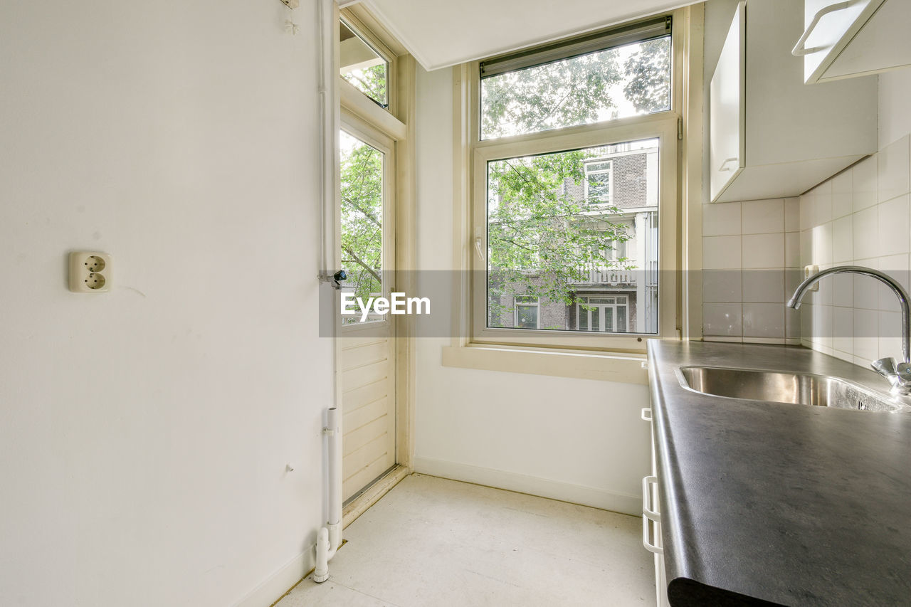 home interior, home, window, indoors, room, architecture, domestic room, house, building, floor, real estate, flooring, no people, built structure, sink, residential district, estate, home showcase interior, lifestyles, interior design, home improvement, luxury, day, wealth, home ownership, household equipment, apartment, domestic life, nature, entrance, diy, bathroom, door