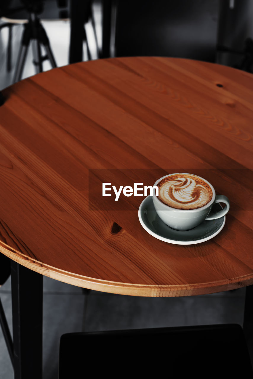 COFFEE CUP AND TABLE