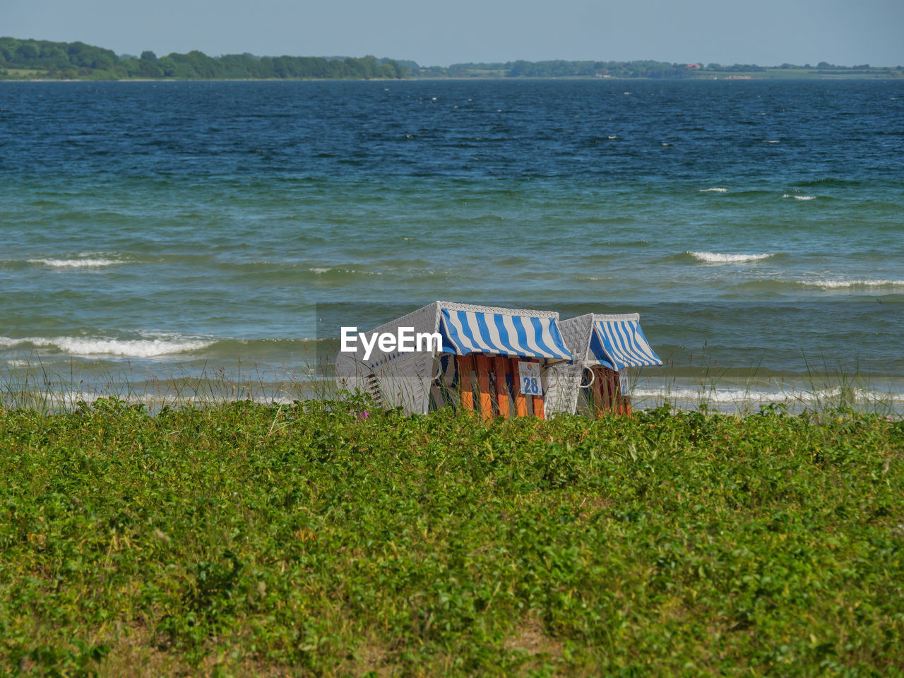 SCENIC VIEW OF BEACH AGAINST SEA