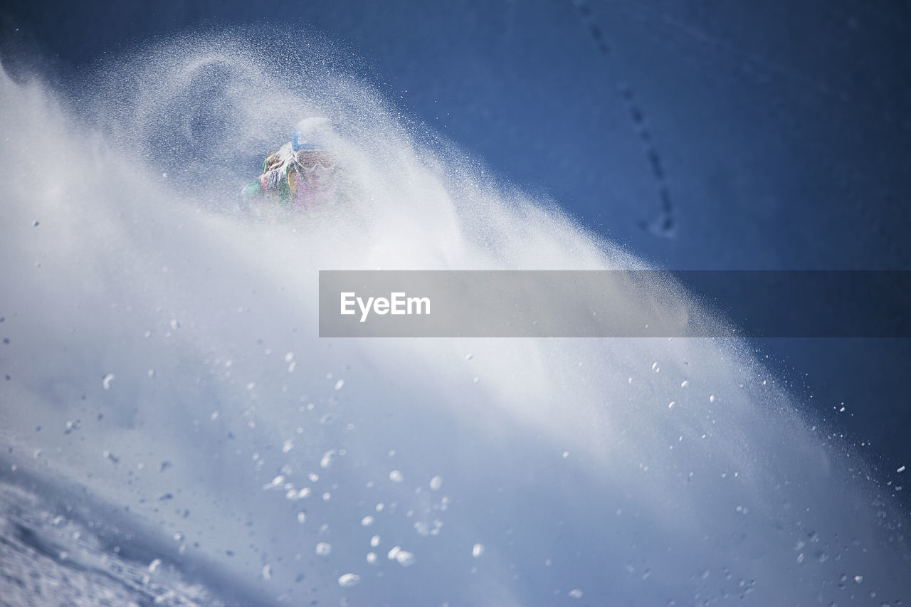 AERIAL VIEW OF PEOPLE ON SNOW