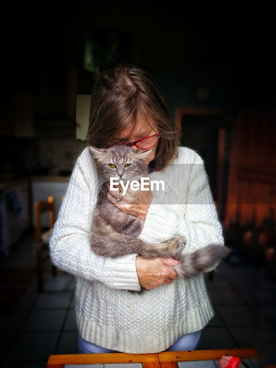 Woman holding cat