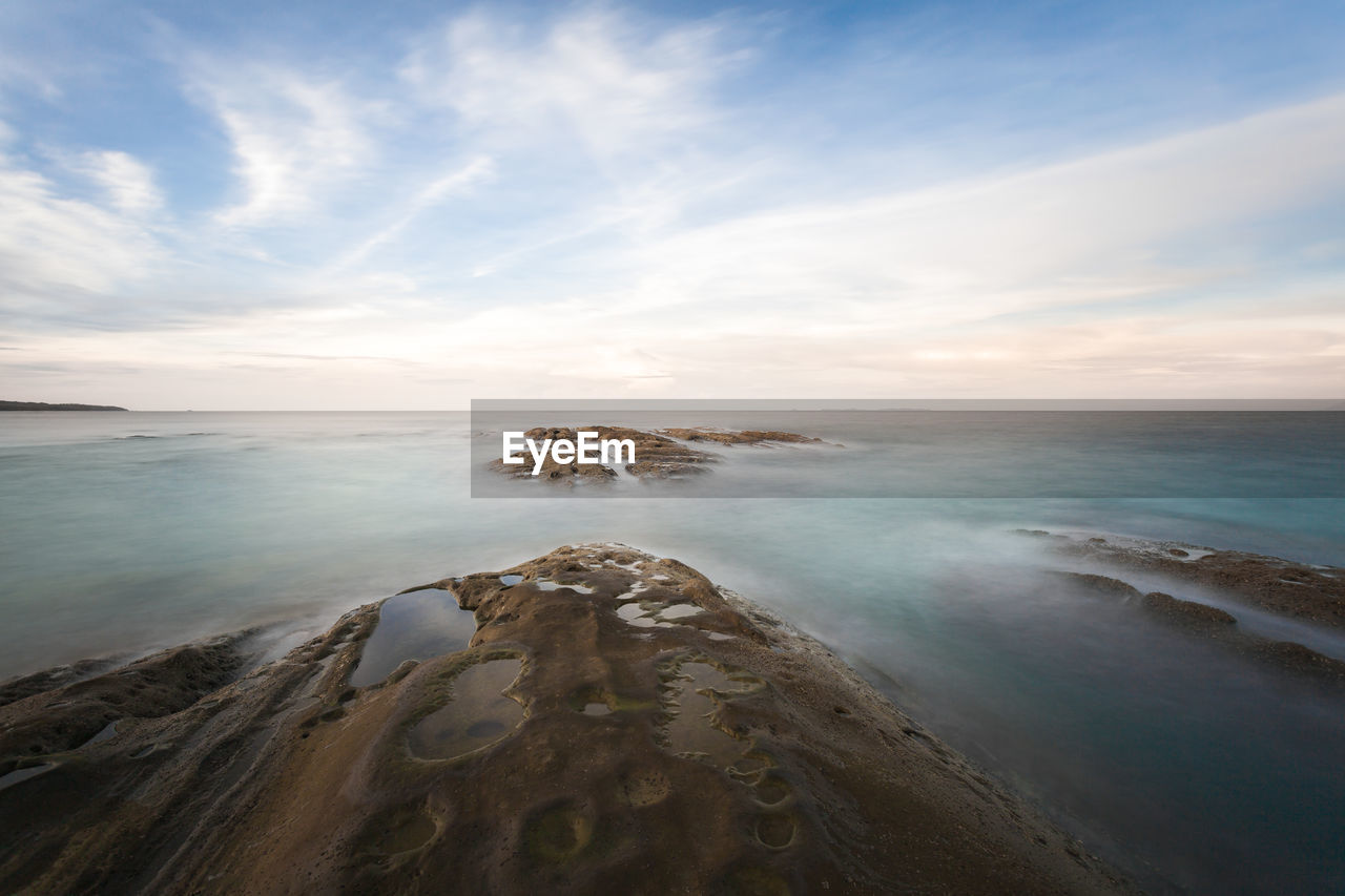 Long exposure capture of coast and ocean on borneo, sabah - malaysia
