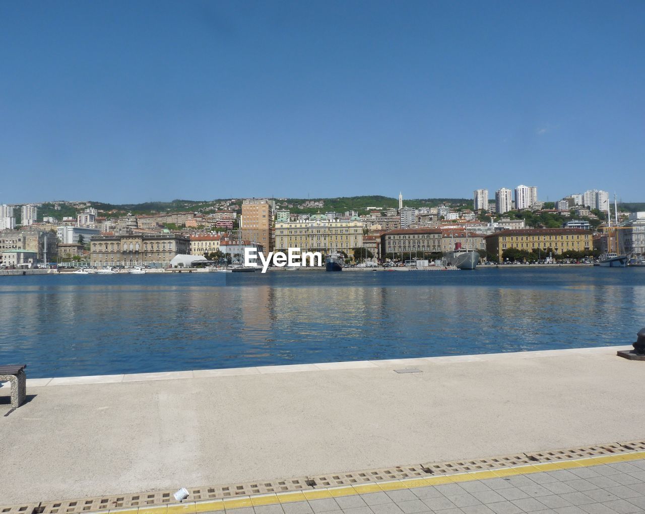 VIEW OF CITYSCAPE AGAINST BLUE SKY