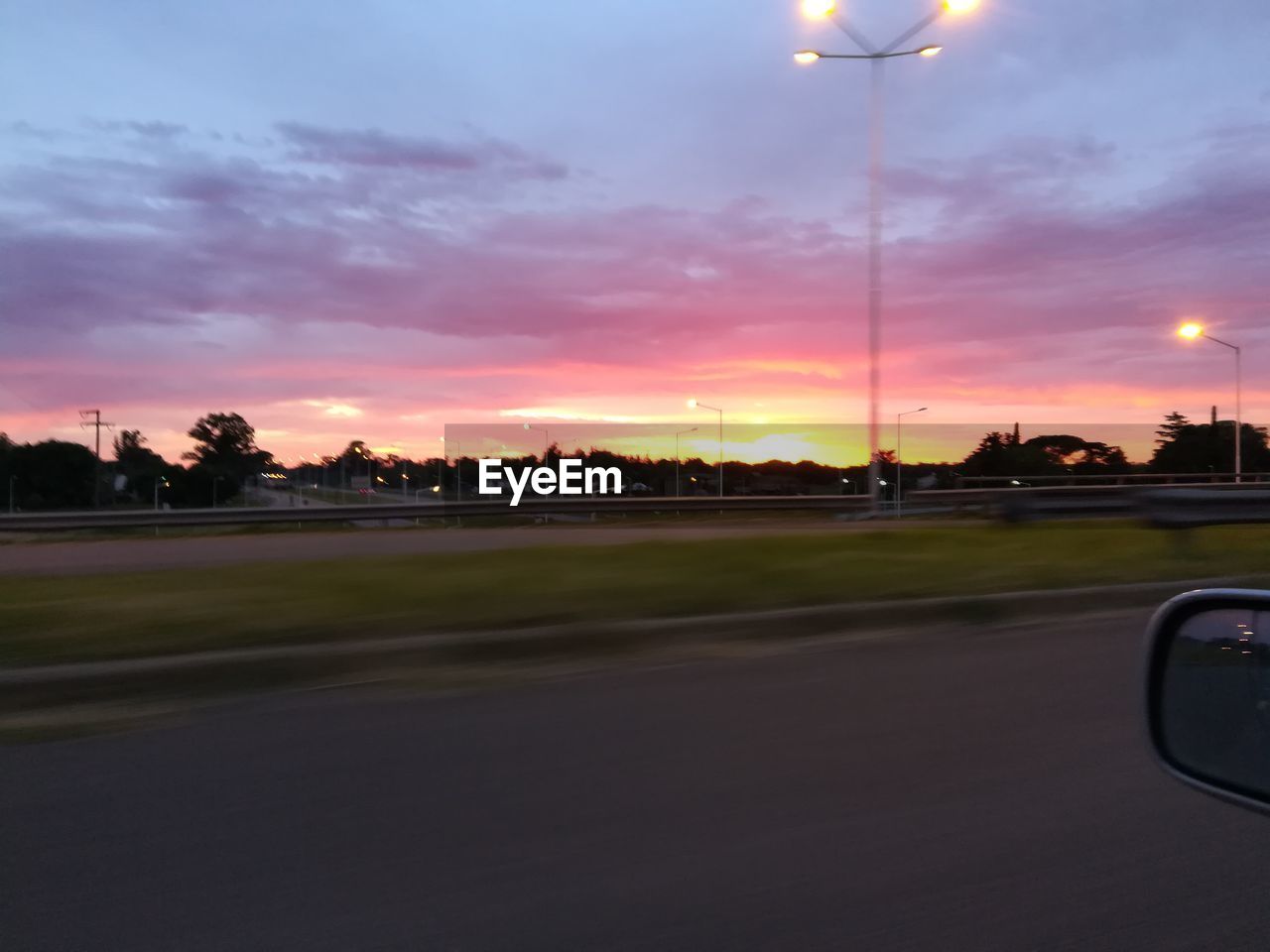 STREET AGAINST SKY AT SUNSET