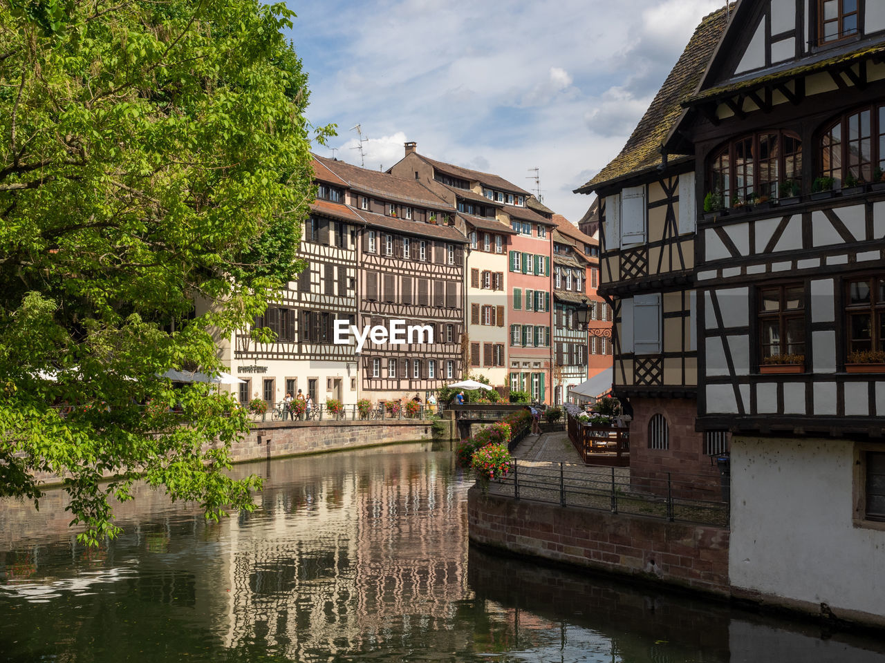 Canal lined with timbered house in strasbourg, france