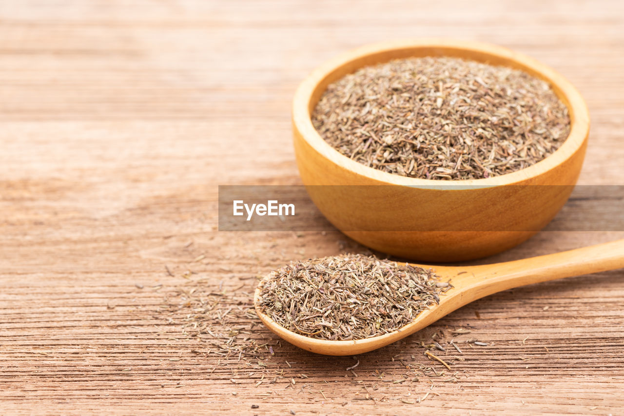 food and drink, wood, food, wellbeing, healthy eating, studio shot, ingredient, indoors, no people, freshness, bowl, spice, seed, spoon, kitchen utensil, wooden spoon, plant, still life, table, close-up, produce, brown