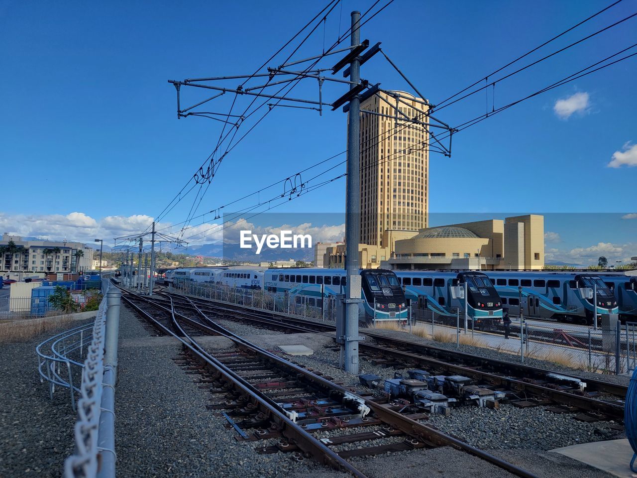 Railroad tracks against clear sky