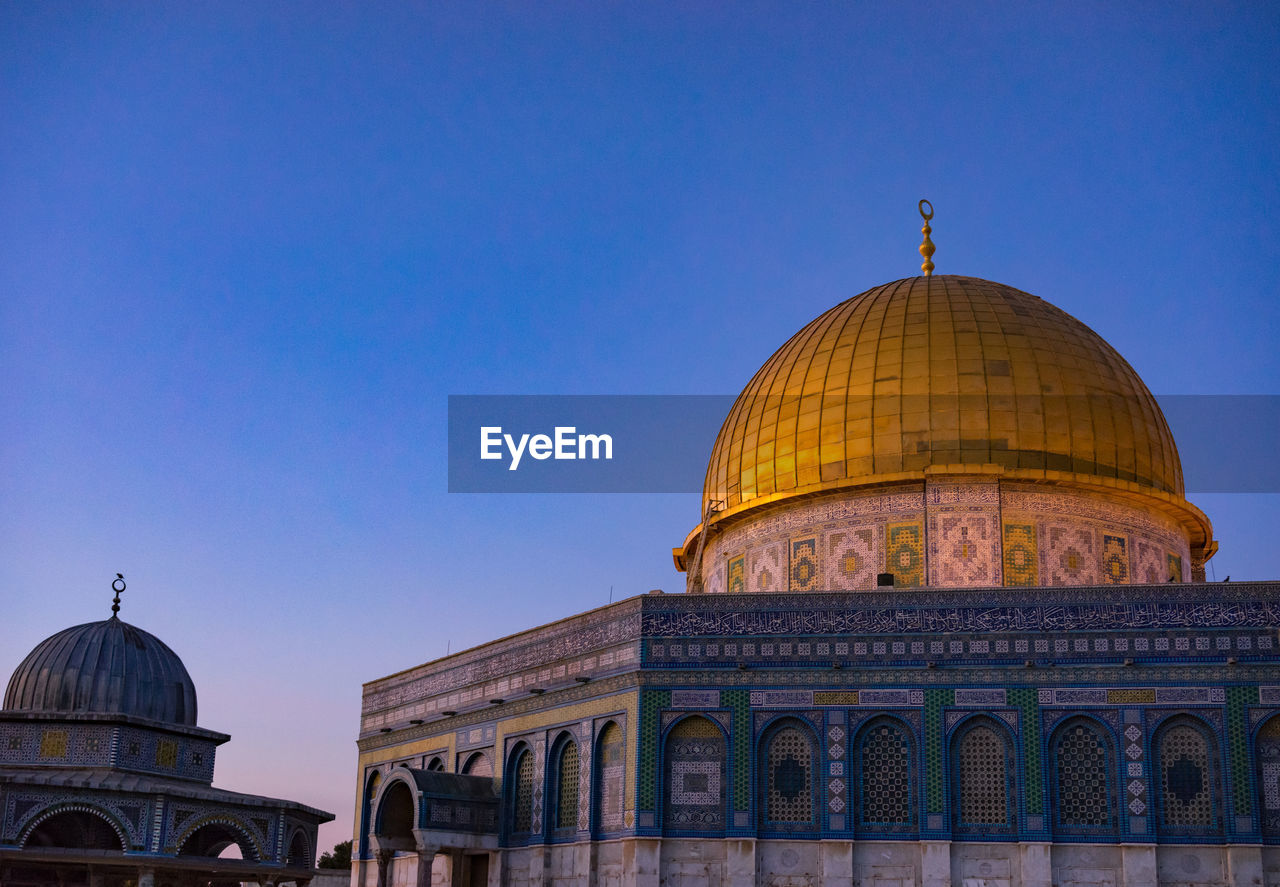 View of masjidil aqsa mosque against clear blue sky