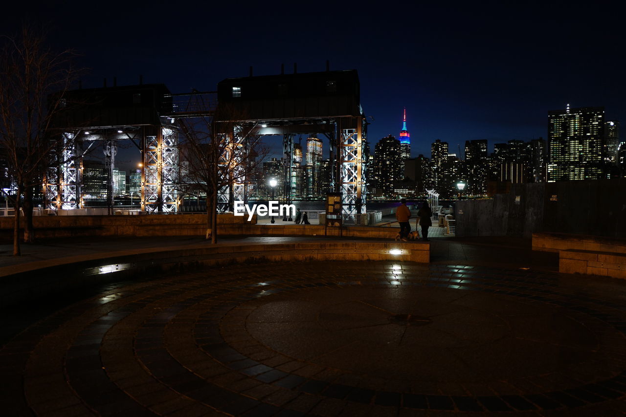 Illuminated cityscape at night