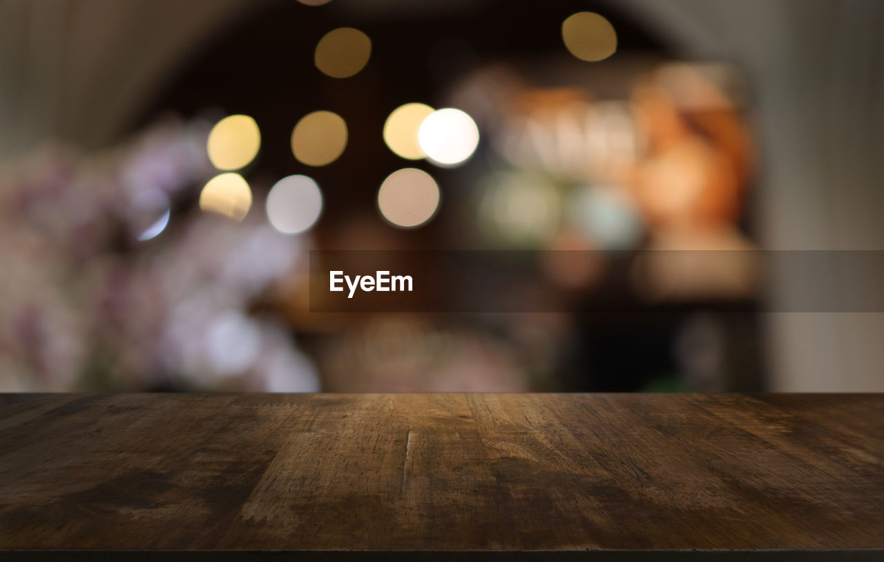 illuminated, wood, table, focus on foreground, indoors, night, lighting, no people, defocused, lighting equipment, decoration, light, selective focus, home interior, celebration