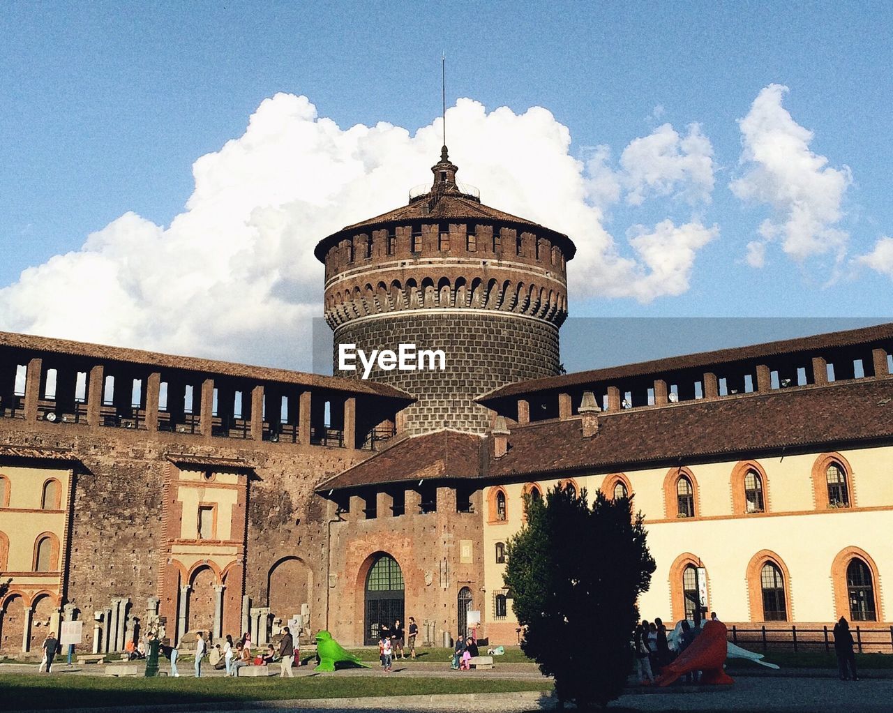 A medieval castle with tourists