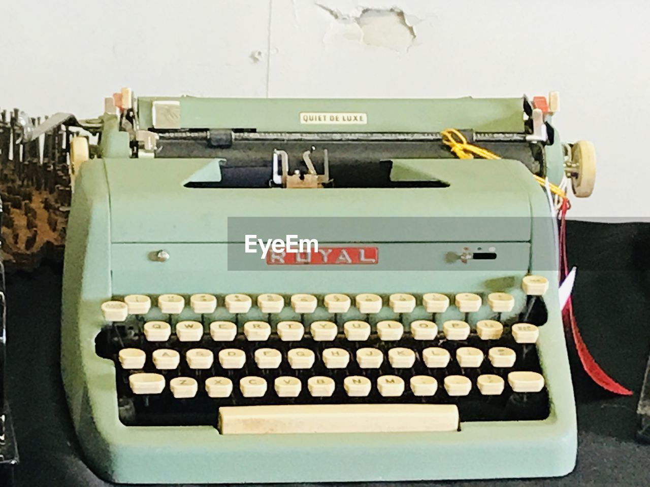 HIGH ANGLE VIEW OF OLD MACHINE PART ON SHELF