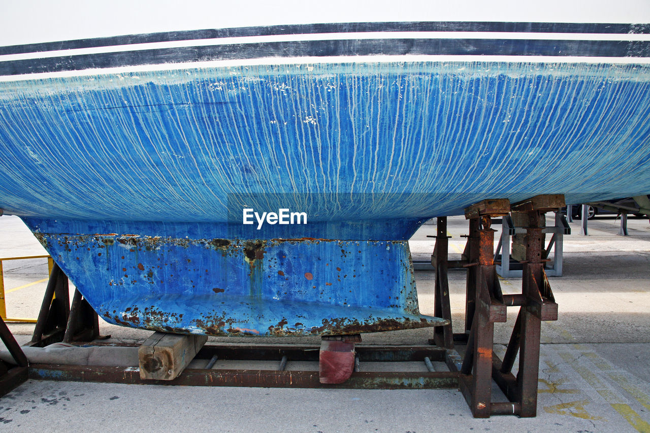 Cropped image of ship moored at harbor