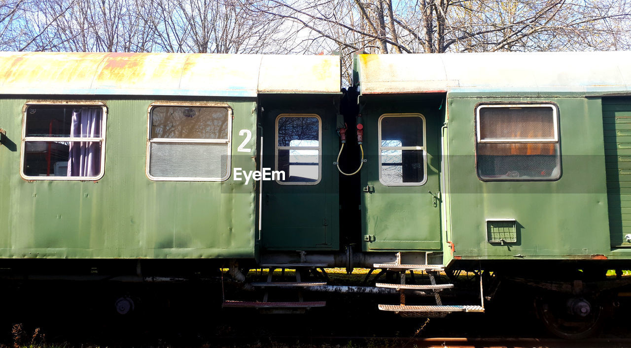 TRAIN AT RAILROAD TRACK