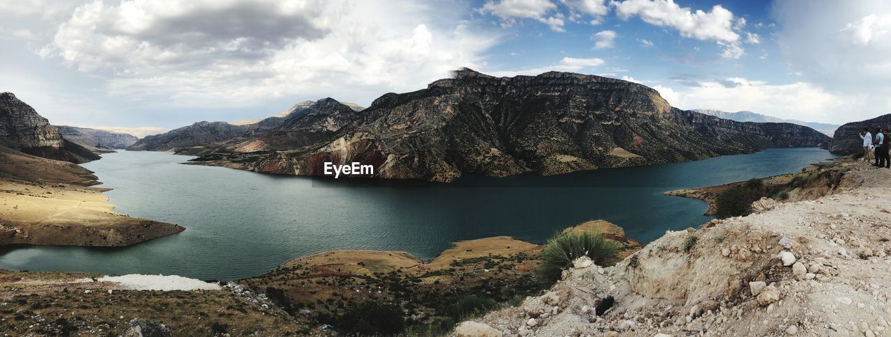 Panoramic view of rocks and mountains against sky