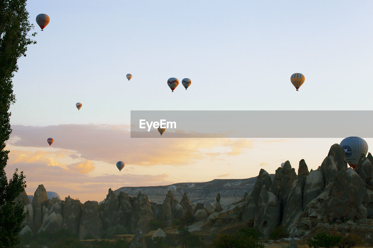 VIEW OF HOT AIR BALLOONS FLYING IN SKY