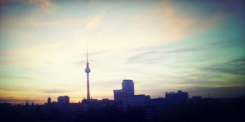 VIEW OF CITYSCAPE AT SUNSET